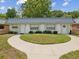 Three-unit building with attractive landscaping at 11935 Bayonet Ln # 0, New Port Richey, FL 34654