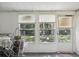 Enclosed Florida room with multiple windows and backyard views at 11935 Bayonet Ln # 0, New Port Richey, FL 34654