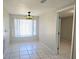 Bright dining area with tiled floor and window seat at 9137 Saint Clair Ln, Port Richey, FL 34668