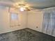 Bedroom with carpet and ceiling fan at 9137 Saint Clair Ln, Port Richey, FL 34668