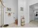 Bathroom with a walk-in shower, toilet, and linen storage adjacent to the main bedroom at 21312 Preservation Dr, Land O Lakes, FL 34638