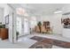 Elegant foyer with a chandelier, arched entryway, and marble flooring at 21312 Preservation Dr, Land O Lakes, FL 34638