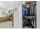Well-organized walk-in closet with ample storage, adjacent to the main bedroom at 21312 Preservation Dr, Land O Lakes, FL 34638