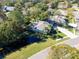 Aerial view of house and surrounding neighborhood at 1592 Eagles Reach, Tarpon Springs, FL 34688