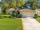 Image 1 of 48: 8510 Winding Wood Dr, Port Richey