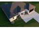 Single-story home with dark roof, driveway, and landscaping at 4101 Valley Brook Ct, Spring Hill, FL 34606