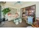 Bright sunroom with comfortable seating area at 7705 Forest Trl # 1, Port Richey, FL 34668