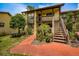 Two-story condo with balcony and landscaped entryway at 7705 Forest Trl # 1, Port Richey, FL 34668