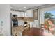 Modern kitchen with white cabinets and stainless steel appliances at 3154 Brigantine Ct, New Port Richey, FL 34652
