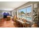 Bright living area showcasing a comfy bench and stunning water views at 3154 Brigantine Ct, New Port Richey, FL 34652
