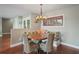 Charming breakfast nook with built-in bench seating and round table at 3154 Brigantine Ct, New Port Richey, FL 34652