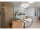 Bathroom with a large walk-in shower, soaking tub, and stylish tile at 3154 Brigantine Ct, New Port Richey, FL 34652