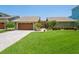 House with a three-car garage and landscaping at 3154 Brigantine Ct, New Port Richey, FL 34652