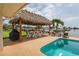 Covered patio with seating and water views at 3154 Brigantine Ct, New Port Richey, FL 34652