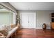 Relaxing sitting area with a built-in bench and large windows at 3154 Brigantine Ct, New Port Richey, FL 34652