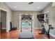 Home gym with a treadmill, stationary bike and access to the pool at 3154 Brigantine Ct, New Port Richey, FL 34652