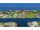 Aerial view of waterfront community with many homes at 3154 Brigantine Ct, New Port Richey, FL 34652