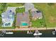 Bird's-eye view of waterfront home and neighborhood at 3154 Brigantine Ct, New Port Richey, FL 34652