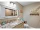 Bathroom with granite countertop, single sink, and walk-in shower at 3154 Brigantine Ct, New Port Richey, FL 34652