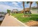 Backyard walkway to waterfront, tiki hut and deck at 3154 Brigantine Ct, New Port Richey, FL 34652