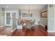 Cozy breakfast nook with built-in bench seating and round table at 3154 Brigantine Ct, New Port Richey, FL 34652