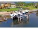 Boat lift at private dock, waterfront property at 3154 Brigantine Ct, New Port Richey, FL 34652