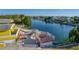 Elevated deck overlooking a canal with waterfront homes, showcasing scenic views at 4040 Hermosa Blvd, Hernando Beach, FL 34607
