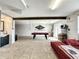 Spacious game room with pool table, seating area, and plenty of room for entertainment at 4040 Hermosa Blvd, Hernando Beach, FL 34607