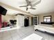 Main bedroom with a workspace and large bed at 4040 Hermosa Blvd, Hernando Beach, FL 34607