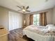 Bedroom with white closet doors and a comfortable bed at 4040 Hermosa Blvd, Hernando Beach, FL 34607