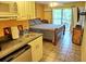 Studio apartment featuring a kitchenette and sleeping area at 2077 Wetland Pt # 1202, Lutz, FL 33558