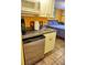 Small kitchenette with microwave, mini-fridge, and sink at 2077 Wetland Pt # 1202, Lutz, FL 33558