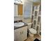 Clean bathroom with a shower/tub combo and updated vanity at 2077 Wetland Pt # 1202, Lutz, FL 33558