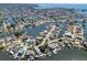 Stunning aerial view of waterfront community with boat docks and beautiful canals at 6629 Harbor Dr, Hudson, FL 34667