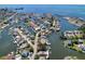 Waterfront home featuring canal access, beautiful landscaping, and a prime location in a desirable neighborhood at 6629 Harbor Dr, Hudson, FL 34667