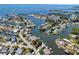 Waterfront home from an aerial view, showcasing the access to community waterways and marinas at 6629 Harbor Dr, Hudson, FL 34667