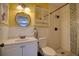 Stylish bathroom with a walk-in shower, decorative tiling, and a modern sink at 6629 Harbor Dr, Hudson, FL 34667