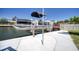 Pontoon boat on a lift system, showing the convenience of waterfront living at 6629 Harbor Dr, Hudson, FL 34667