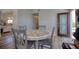 Dining room with compass rose inlay on the table top at 6629 Harbor Dr, Hudson, FL 34667