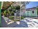 Exterior staircase on a home with a lush backyard and a view of the green accessory dwelling and waterfront at 6629 Harbor Dr, Hudson, FL 34667