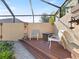 Spacious pool deck with seating area and fire pit at 5378 Legend Hills Ln, Spring Hill, FL 34609