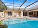 Refreshing pool with ample surrounding deck space at 5378 Legend Hills Ln, Spring Hill, FL 34609