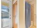 Bathroom with shower, linen closet, and pool access at 5378 Legend Hills Ln, Spring Hill, FL 34609