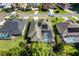 Single Gathering home with solar panels and a screened pool at 5378 Legend Hills Ln, Spring Hill, FL 34609