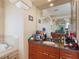 Double vanity bathroom with a large soaking tub at 5378 Legend Hills Ln, Spring Hill, FL 34609