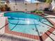 Stunning inground pool with brick coping and ample deck space at 5378 Legend Hills Ln, Spring Hill, FL 34609
