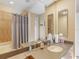 Bathroom with a double vanity and a tub at 5378 Legend Hills Ln, Spring Hill, FL 34609