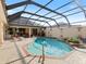 Inviting screened pool and spa with ample deck space at 5378 Legend Hills Ln, Spring Hill, FL 34609