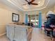 Gathering room with sectional sofa, game consoles and pool view at 5378 Legend Hills Ln, Spring Hill, FL 34609