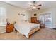 Bright main bedroom with pool access and plantation shutters at 5378 Legend Hills Ln, Spring Hill, FL 34609